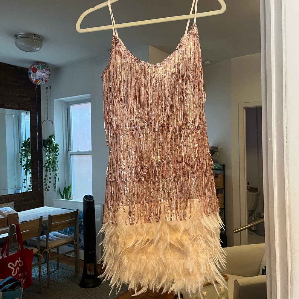 Feathered sequin disco dress